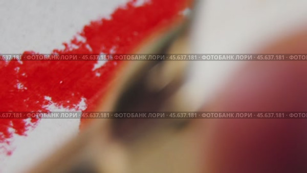 Witness the mesmerizing process of creating abstract art using only lipstick and white cardboard. Стоковое видео, видеограф Ярославский Максим / Фотобанк Лори