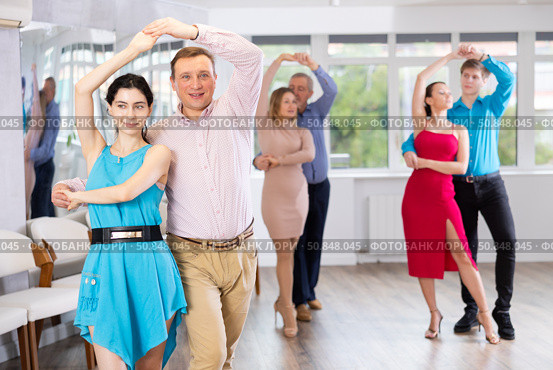 Woman and man learning to dance Vienneze waltz in dancing class. Стоковое фото, фотограф Яков Филимонов / Фотобанк Лори