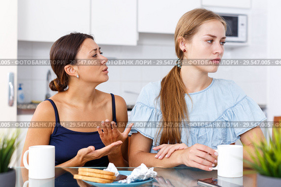 Woman apologizing from offended friend. Стоковое фото, фотограф Яков Филимонов / Фотобанк Лори