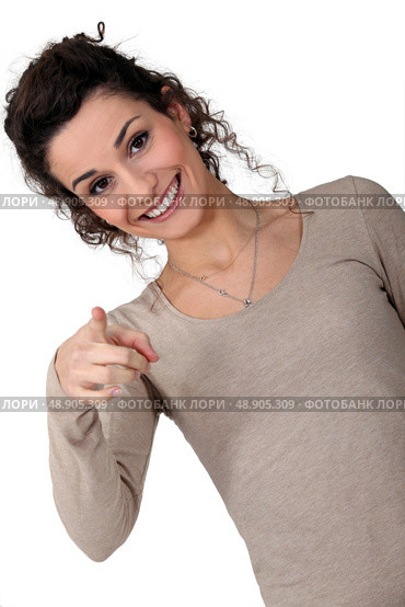 Woman giggling and pointing. Стоковое фото, агентство Ingram Publishing / Фотобанк Лори