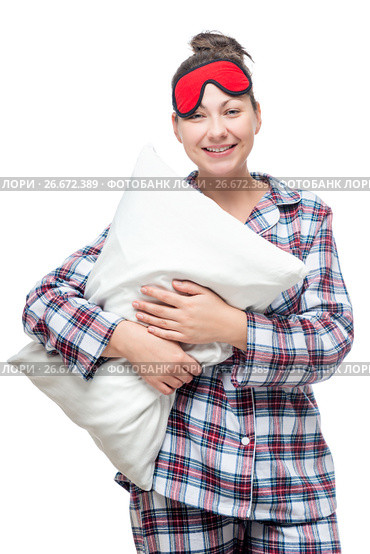 Woman in clothes for sleep with a pillow in hands on a white background. Стоковое фото, фотограф Константин Лабунский / Фотобанк Лори