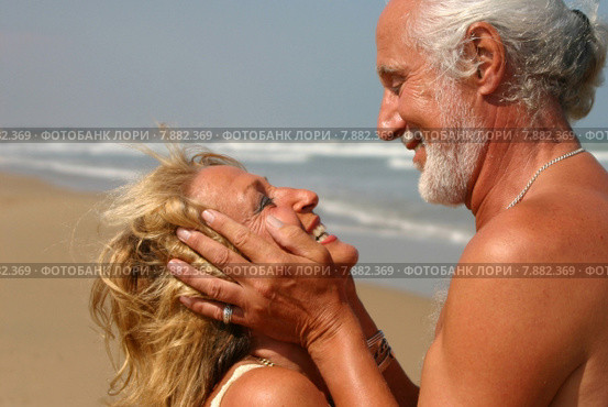 woman man smiling smile water. Стоковое фото, фотограф Marc Jones / PantherMedia / Фотобанк Лори