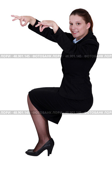 Woman pretending to be puppeteer. Стоковое фото, агентство Ingram Publishing / Фотобанк Лори