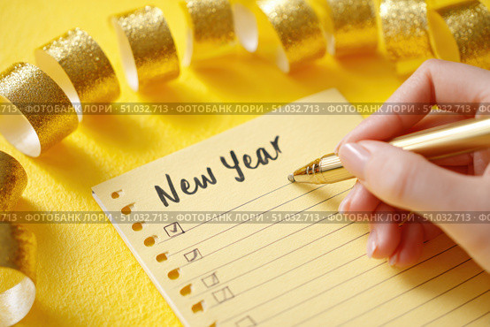 Woman's hand writing in empty notebook at the desk with Christmas decoration. Back to life, goal list. Plan, goals, checklist, idea concept. Top view, copy space. New Year. Blank White Paper Sheet. Стоковое AI-изображение, AI-художник Марина Демидюк / Фотобанк Лори