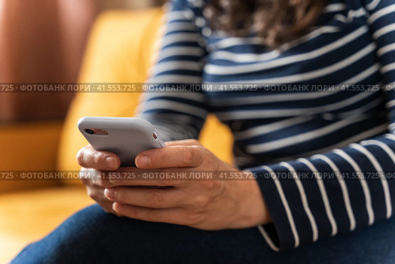 women's hands that confidently hold a smartphone, modern technology. Стоковое фото, фотограф Андрей Знаменский / Фотобанк Лори