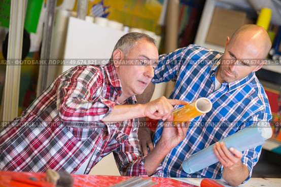 working at a printers shop. Стоковое фото, агентство Ingram Publishing / Фотобанк Лори