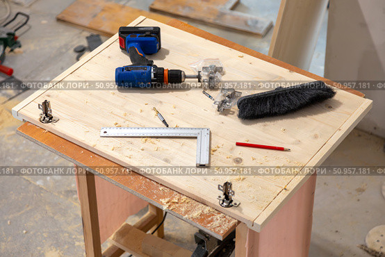 Working tools on a wooden table in a carpentry workshop, close-up. Стоковое фото, фотограф Nobilior / Фотобанк Лори