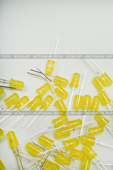 Yellow LED lamps. A scattering of electronic elements. Light-emitting diodes. Стоковое фото, фотограф Valeriy Lushchikov / Фотобанк Лори