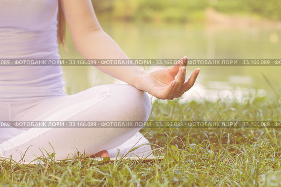 Yoga Woman Meditating Relaxing Healthy Lifestyle. Стоковое фото, фотограф Mitar gavric / PantherMedia / Фотобанк Лори