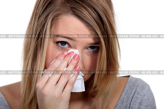 Young blond woman crying. Стоковое фото, агентство Ingram Publishing / Фотобанк Лори