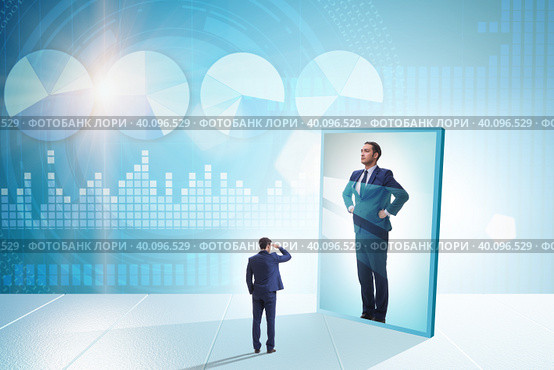 Young businessman in alter ego concept. Стоковое фото, фотограф Elnur / Фотобанк Лори