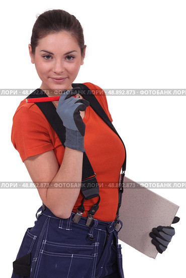 Young female renovator. Стоковое фото, агентство Ingram Publishing / Фотобанк Лори