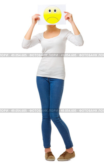 Young girl in jeans with sad poster isolated. Стоковое фото, агентство Ingram Publishing / Фотобанк Лори