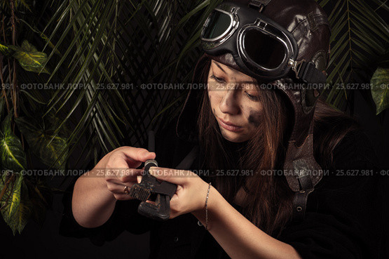 Young girl mechanic with adjustable wrench. Стоковое фото, фотограф Quadshock / Фотобанк Лори
