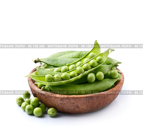 Young green peas vegetables in wooden plate. Стоковое фото, фотограф Волошина Мария Ивановна / Фотобанк Лори