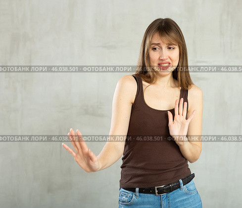 Young indifferent woman not agreeing to anything offered to her. Стоковое фото, фотограф Яков Филимонов / Фотобанк Лори