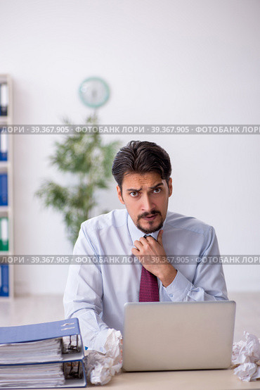Young male employee in rejected ideas concept. Стоковое фото, фотограф Elnur / Фотобанк Лори