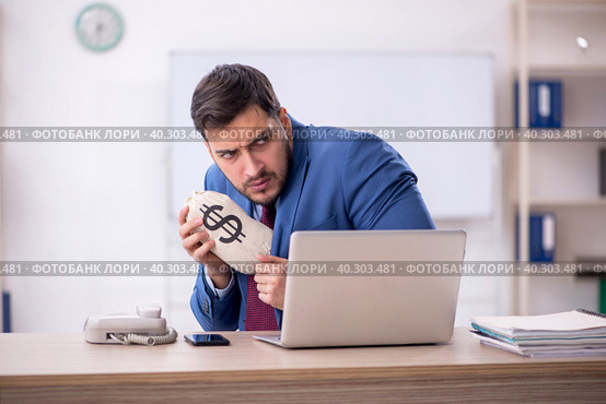 Young male employee in remuneration concept. Стоковое фото, фотограф Elnur / Фотобанк Лори