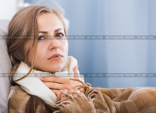 Young woman catching cold. Стоковое фото, фотограф Яков Филимонов / Фотобанк Лори