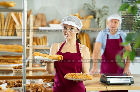 Young woman with bocadillo in bakery. Стоковое фото, фотограф Яков Филимонов / Фотобанк Лори