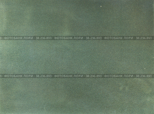 Зеленый фон. Текстура бархатной флисовой бумаги. Крупным планом. Green background. Velvet fleecy paper texture. Closeup. Стоковое фото, фотограф Марина Шабардина / Фотобанк Лори